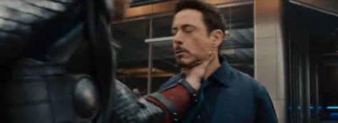 Thor grabs Tony by his throat